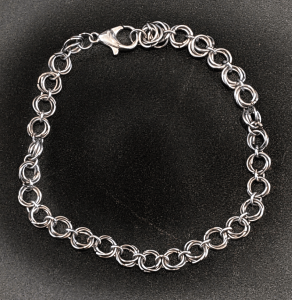 pxl_20260608_2150387208002093486434004018 3 Ring Mobius Weave Chainmail Bracelet